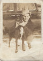 John Wright, Junior as a young man with much loved dog Brownie.jpg