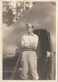 John Wright, Jr. WWII standing in front of tent.jpg